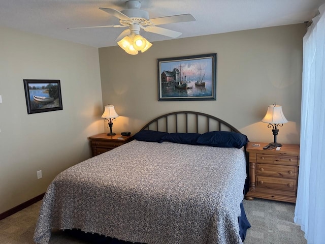 bedroom featuring baseboards, carpet, and ceiling fan