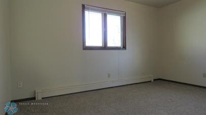 empty room with baseboard heating