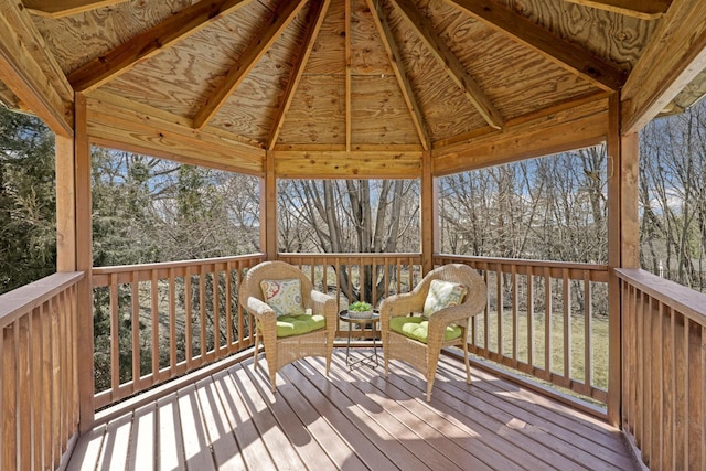 wooden terrace featuring a gazebo