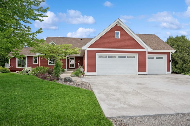 5191 Christen Ave NE, Buffalo, MN 55313 - view of front of property with concrete driveway, a garage, a front yard, and a shingled roof
