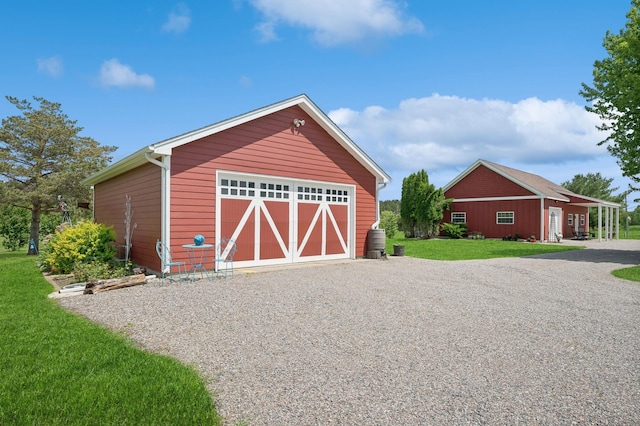 5191 Christen Ave NE, Buffalo, MN 55313 - detached garage with gravel driveway