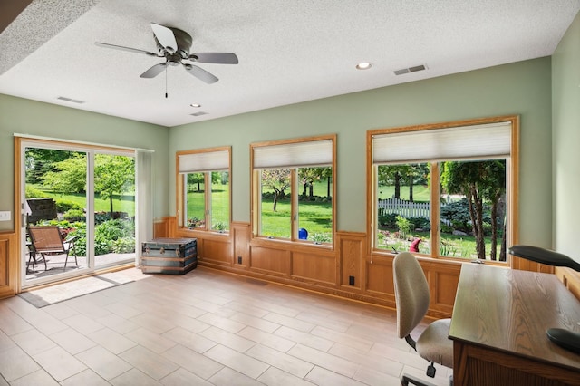 5191 Christen Ave NE, Buffalo, MN 55313 - office featuring ceiling fan, visible vents, a textured ceiling, and a wainscoted wall