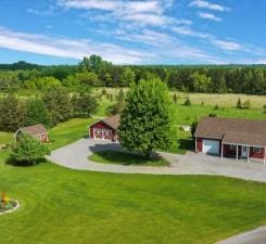 5191 Christen Ave NE, Buffalo, MN 55313 - birds eye view of property with a wooded view