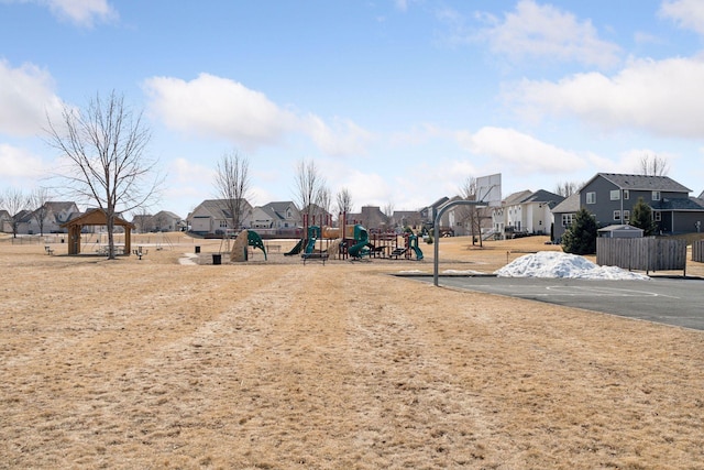 view of yard featuring a gazebo, playground community, and a residential view