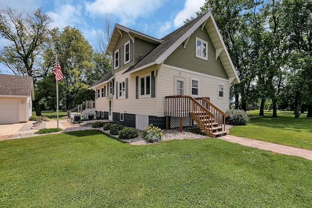 exterior space featuring a front yard and a shingled roof