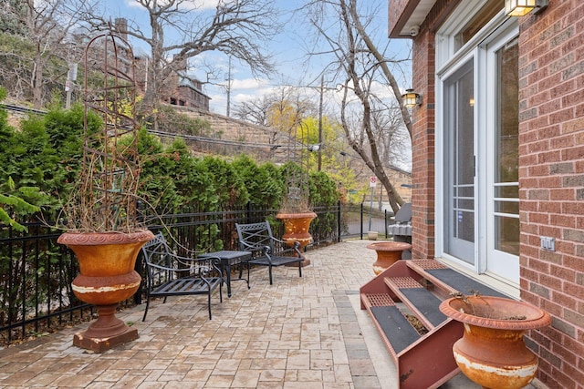 view of patio / terrace with fence