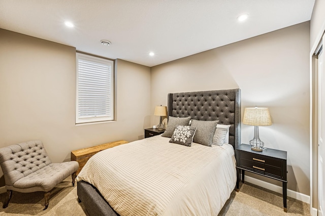 carpeted bedroom featuring recessed lighting and baseboards