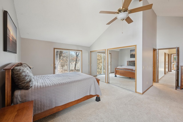 bedroom with high vaulted ceiling, ceiling fan, multiple closets, access to outside, and carpet flooring