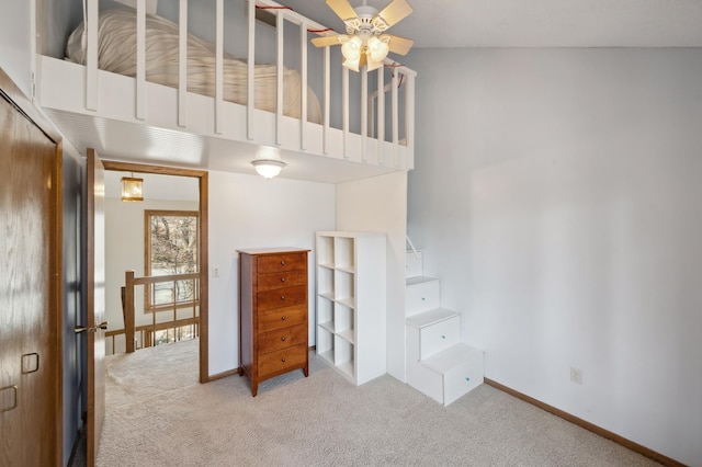 bedroom with baseboards and carpet floors