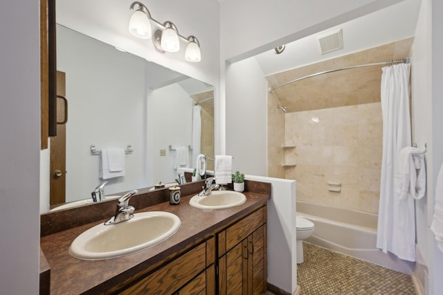 bathroom featuring a sink, visible vents, shower / bathtub combination with curtain, and double vanity