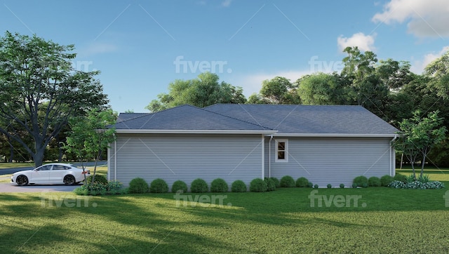 view of home's exterior with a lawn and roof with shingles