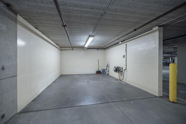 parking deck featuring concrete block wall