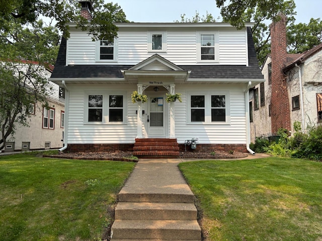 5026 Nokomis Ave, Minneapolis, MN 55417 - view of front facade featuring entry steps, a shingled roof, and a front yard