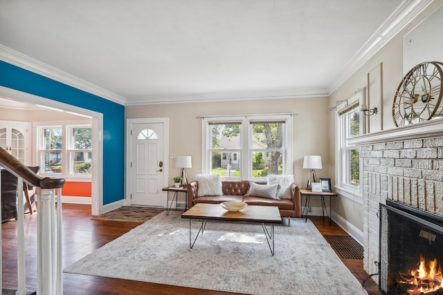 5026 Nokomis Ave, Minneapolis, MN 55417 - living area with a fireplace, baseboards, ornamental molding, and dark wood-type flooring