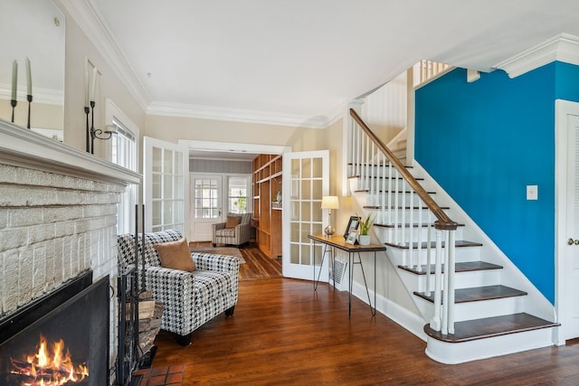 5026 Nokomis Ave, Minneapolis, MN 55417 - stairs featuring ornamental molding, wood finished floors, a brick fireplace, and french doors