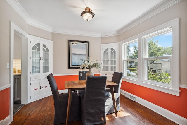 5026 Nokomis Ave, Minneapolis, MN 55417 - dining space featuring dark wood-type flooring, ornamental molding, and baseboards