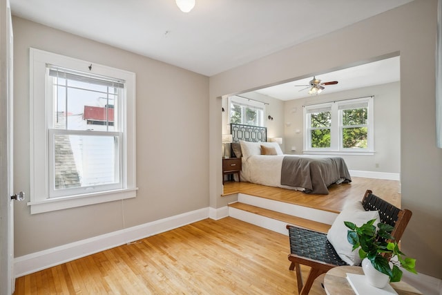 5026 Nokomis Ave, Minneapolis, MN 55417 - bedroom with wood finished floors, baseboards, and a ceiling fan
