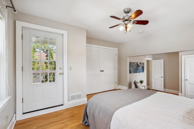5026 Nokomis Ave, Minneapolis, MN 55417 - bedroom with light wood-style flooring, baseboards, a ceiling fan, and a closet