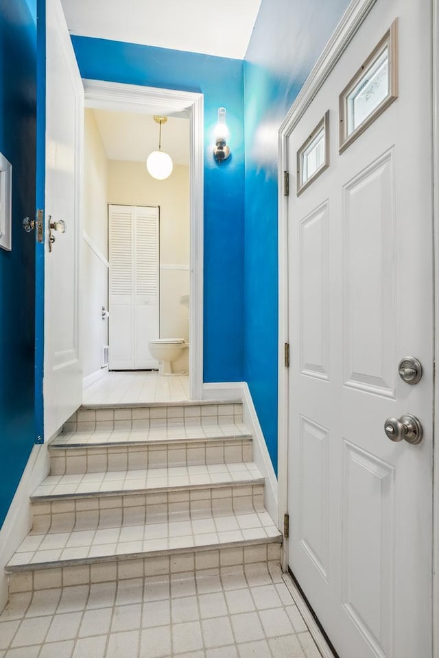 5026 Nokomis Ave, Minneapolis, MN 55417 - stairway featuring tile patterned flooring and baseboards