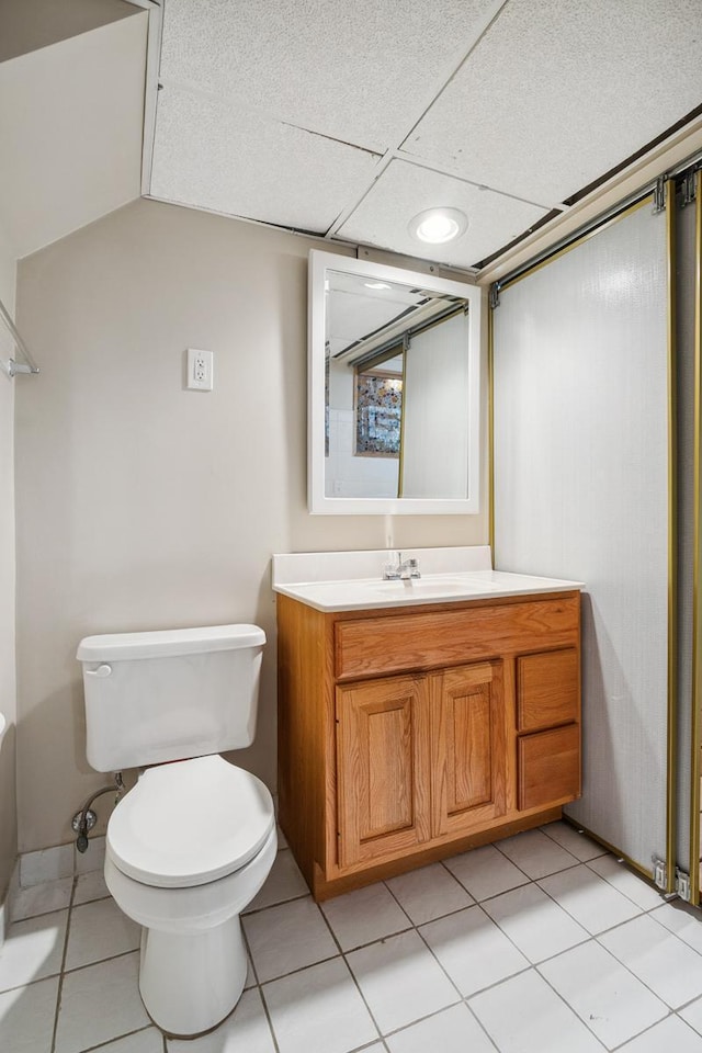 5026 Nokomis Ave, Minneapolis, MN 55417 - bathroom with toilet, vanity, and tile patterned flooring