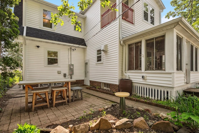 5026 Nokomis Ave, Minneapolis, MN 55417 - rear view of property with a patio area, a sunroom, and outdoor dining area