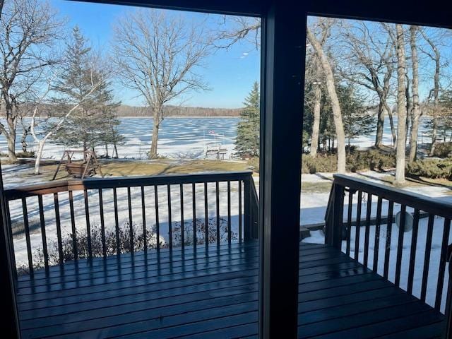 wooden terrace with a water view