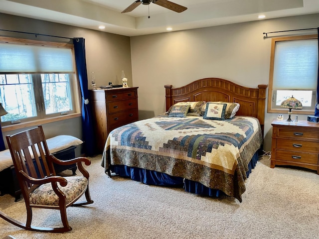 bedroom featuring recessed lighting, light colored carpet, and a ceiling fan