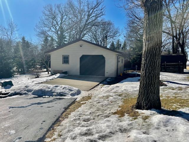 view of snow covered garage