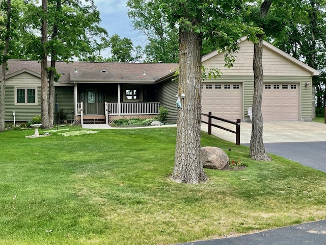 26909 Lake Ethel Rd, Girard Twp, MN 56515 - ranch-style home with a front yard, concrete driveway, covered porch, and a shingled roof