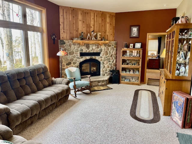 26909 Lake Ethel Rd, Girard Twp, MN 56515 - carpeted living room featuring a stone fireplace