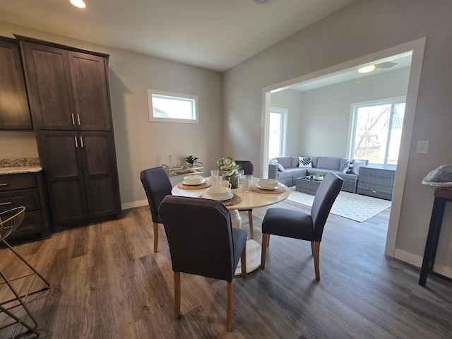 dining space featuring recessed lighting, dark wood-style floors, and baseboards