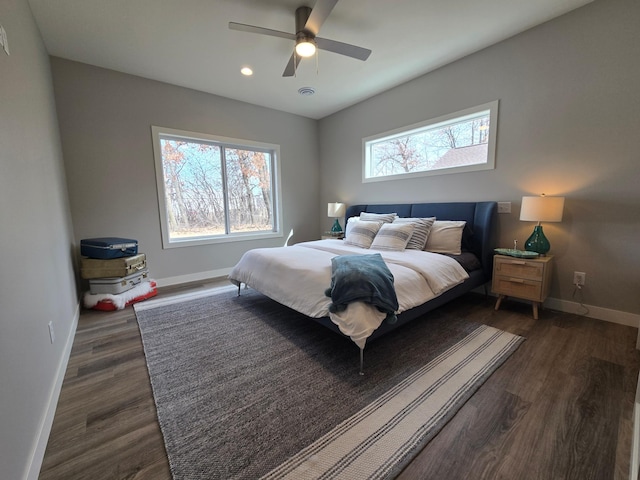 bedroom featuring recessed lighting, baseboards, dark wood-type flooring, and a ceiling fan