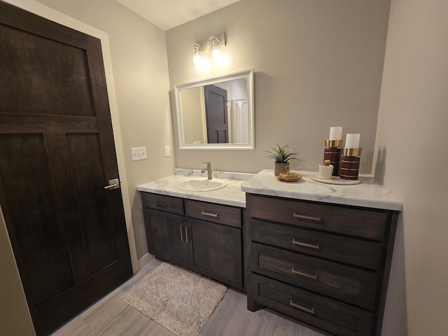 full bathroom with vanity