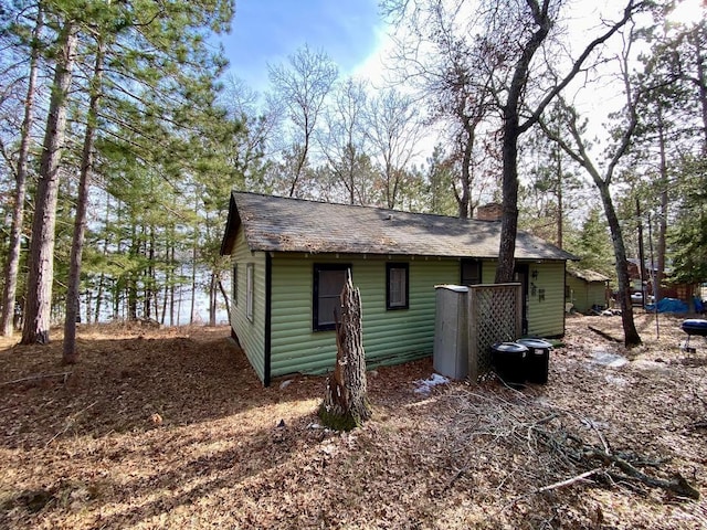 exterior space featuring a chimney