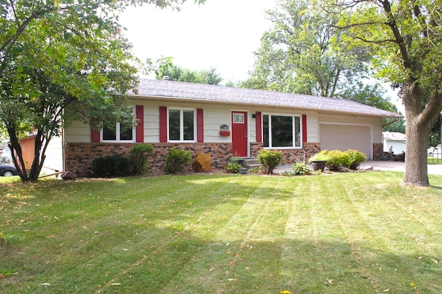 ranch-style house with a front yard, an attached garage, brick siding, and driveway