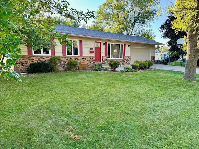 single story home with a garage, driveway, brick siding, and a front lawn