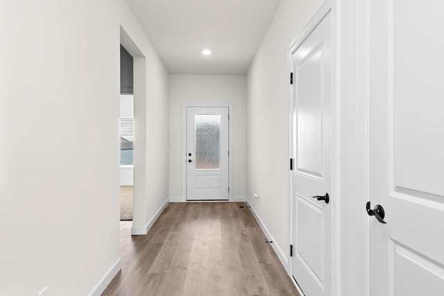 18746 Ivanhoe St NW, Elk River, MN 55330 - entryway with light wood-style flooring and recessed lighting