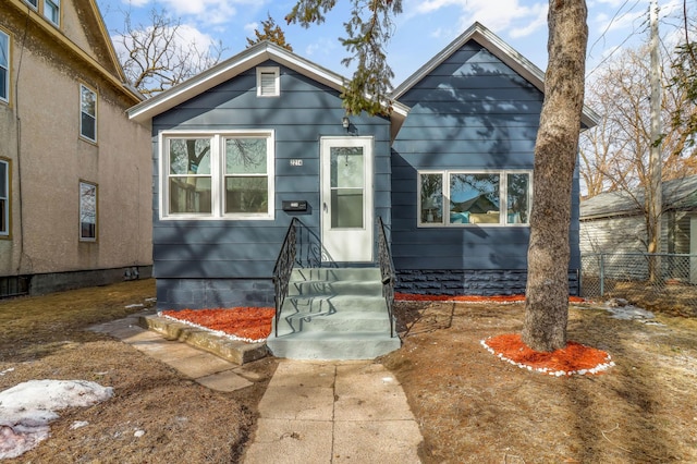 view of front of property with fence