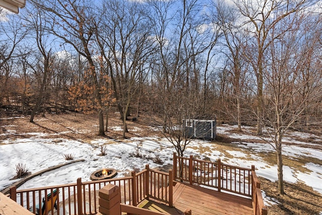 view of snow covered deck