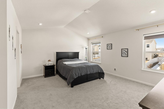 bedroom with recessed lighting, baseboards, carpet, and lofted ceiling