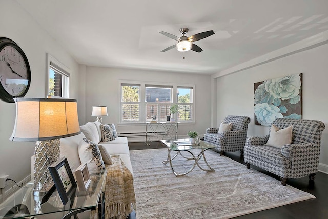 79 Western Ave N Unit 308, Saint Paul, MN 55102 - living room with wood finished floors, ceiling fan, baseboard heating, and baseboards