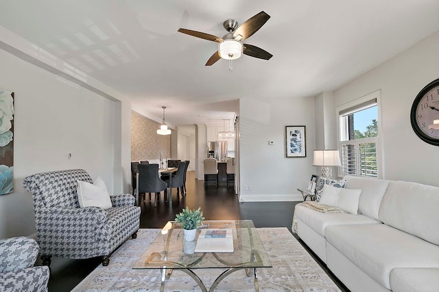 79 Western Ave N Unit 308, Saint Paul, MN 55102 - living room with a ceiling fan, wood finished floors, and baseboards
