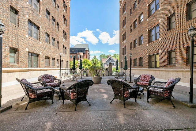 79 Western Ave N Unit 308, Saint Paul, MN 55102 - view of patio with outdoor lounge area