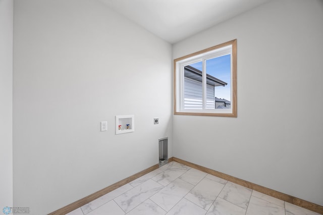 laundry area featuring washer hookup, hookup for an electric dryer, laundry area, baseboards, and marble finish floor