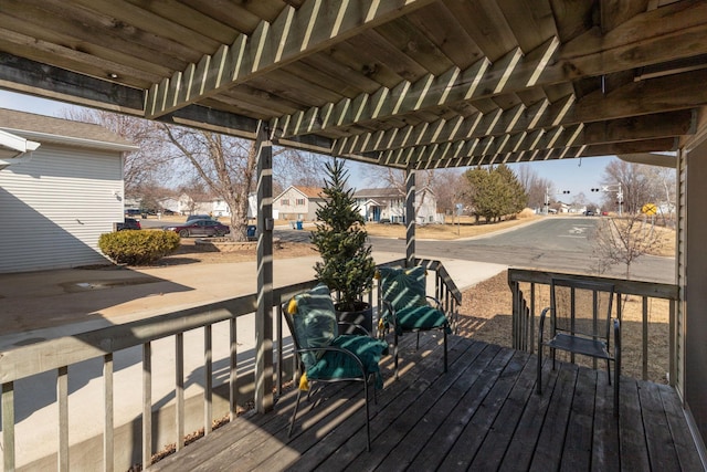 wooden deck with a residential view