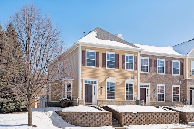 view of front of house with a chimney