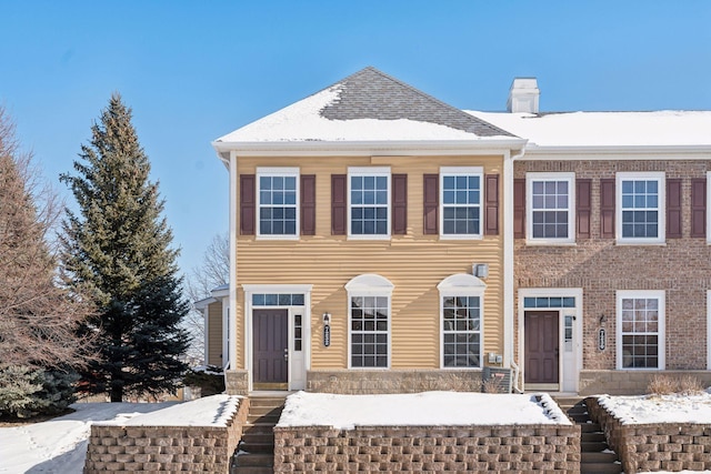 view of front of home with a chimney