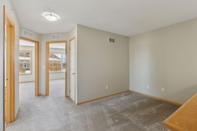 interior space featuring visible vents and baseboards