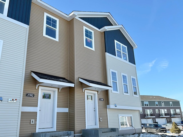 townhome / multi-family property with board and batten siding