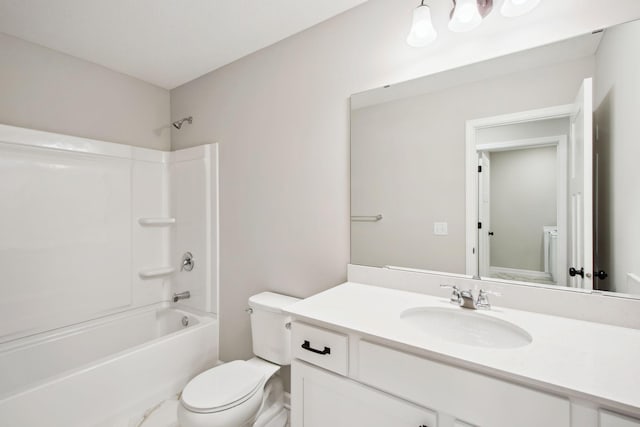 full bathroom featuring vanity, toilet, and  shower combination